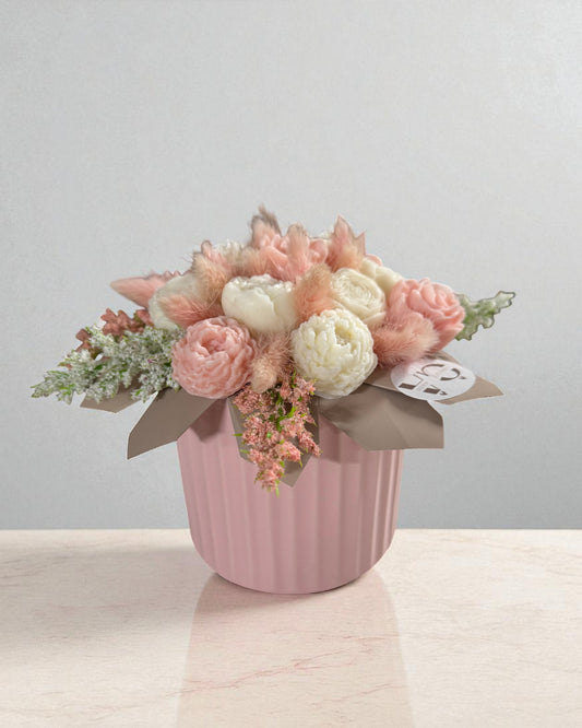 Vaso rosa con candele